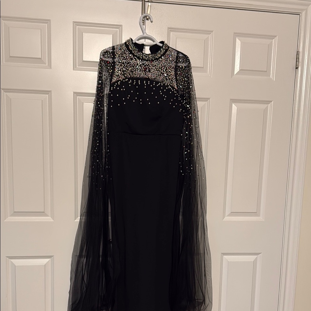 Elegant Black Gown with Beaded Cape